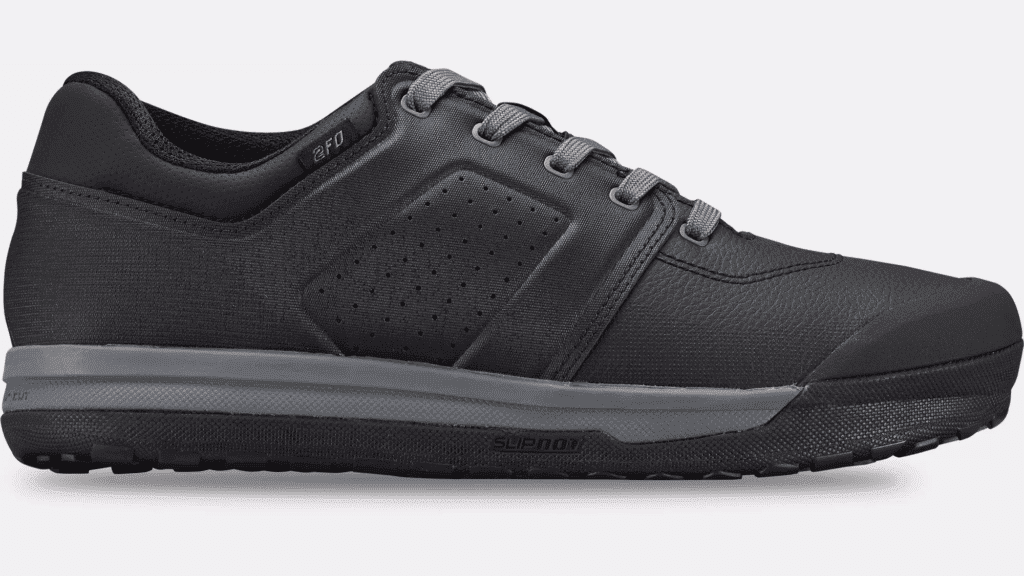 Lightweight black athletic sneaker with cushioned sole for optimal comfort.